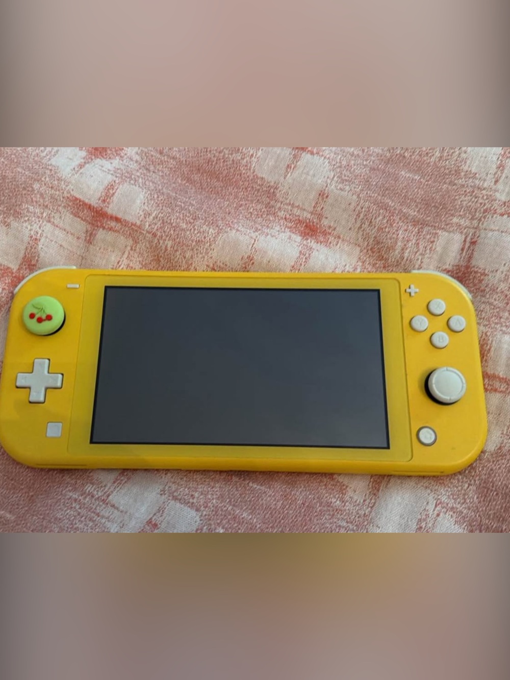 Yellow Handheld Nintendo Switch with Animal Crossing game